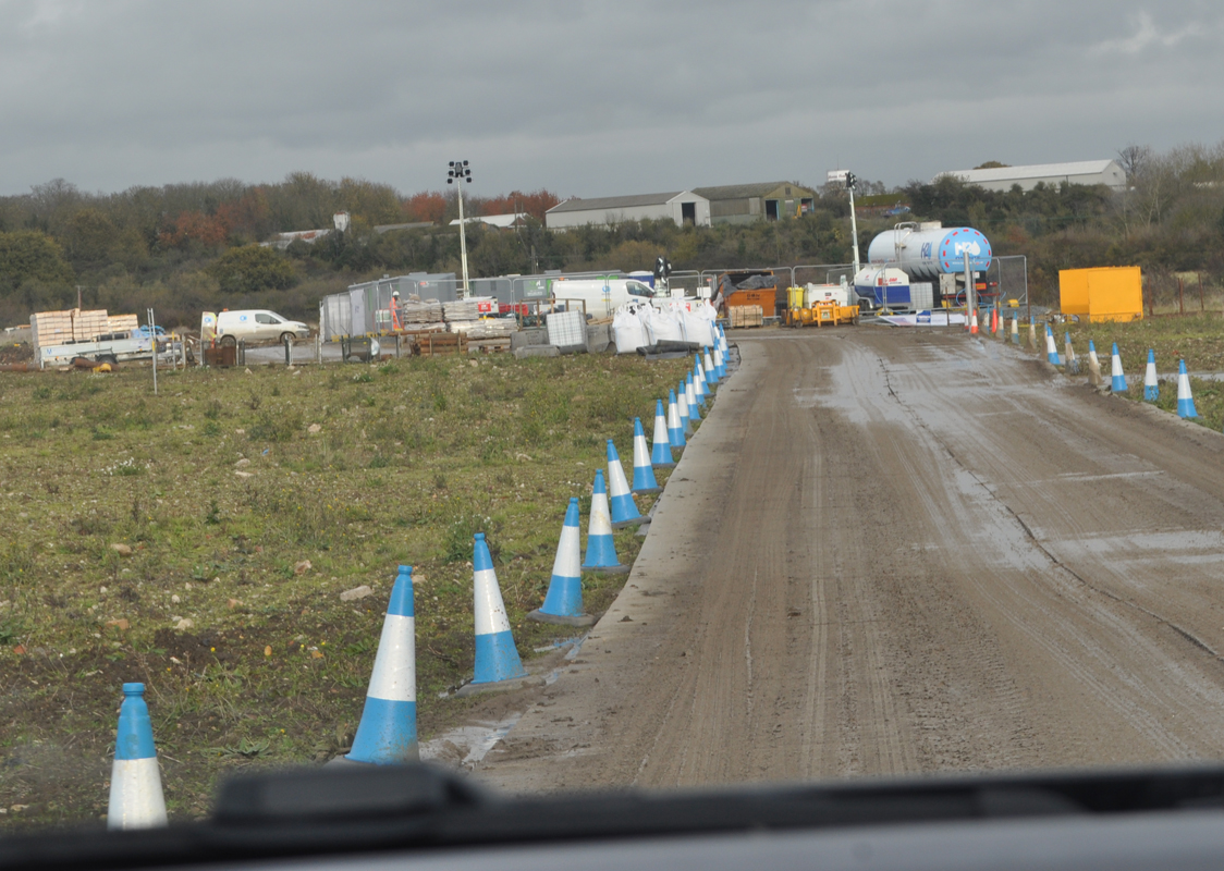 Lower Thames Crossing Ground Investigation Site Visit - Ground Investigation works compound in a field