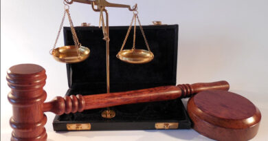 Legal Challenges showing a judges gavel and the scales of justice