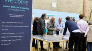 Local Refinement Consultation Announced - image of people around a table with consultation map and displays